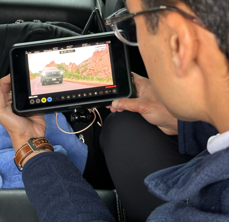 Close up of director monitor while filming Chevrolet running footage at garden of the gods